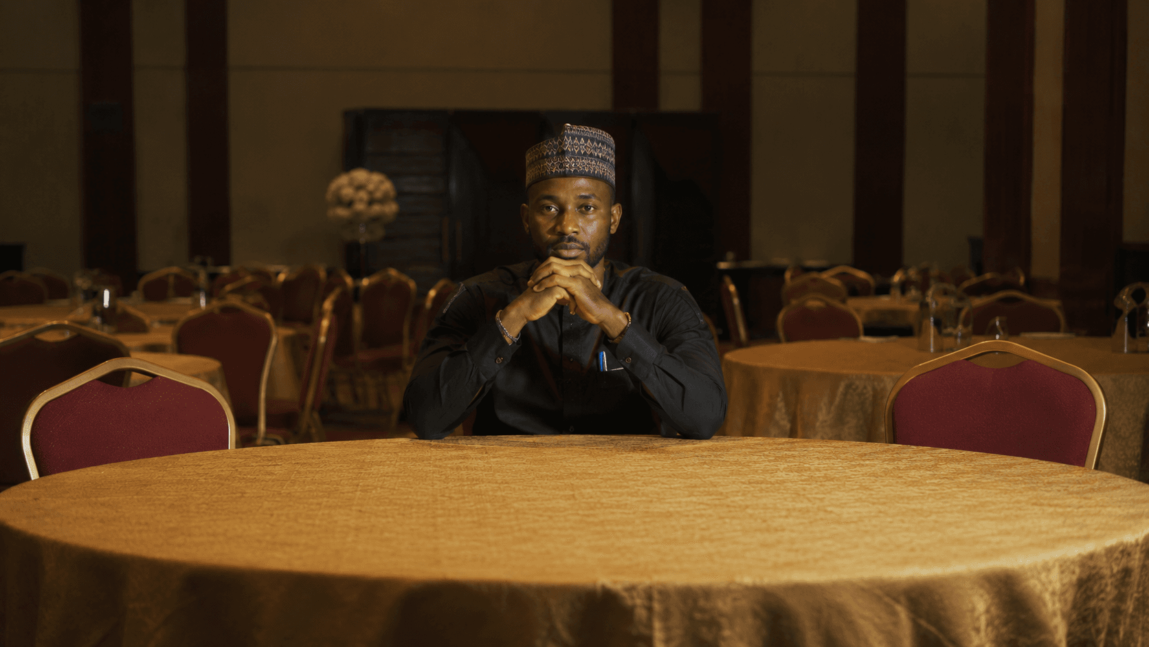 Man in thought at a table
